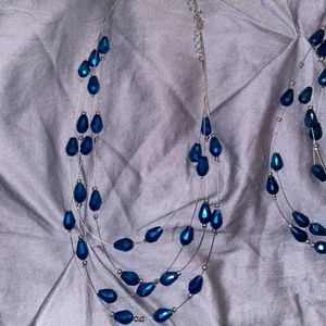 2 necklaces and 1 pair of earrings